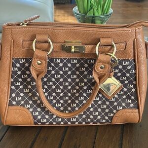 Elegant Brown and Tan Satchel with Gold-Tone Accents